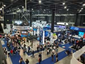 photo of a busy exhibition floor from above